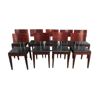 Suite of 9 black skai chairs and scandinavian chrome