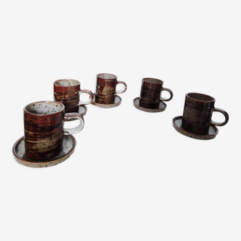 Set of 5 coffee cups and 5 assorted saucers
