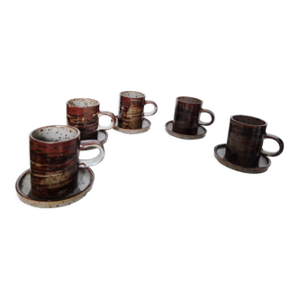 Set of 5 coffee cups and 5 assorted saucers