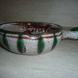 Frying pan with fat lava and ceramic fish decor