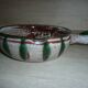 Frying pan with fat lava and ceramic fish decor