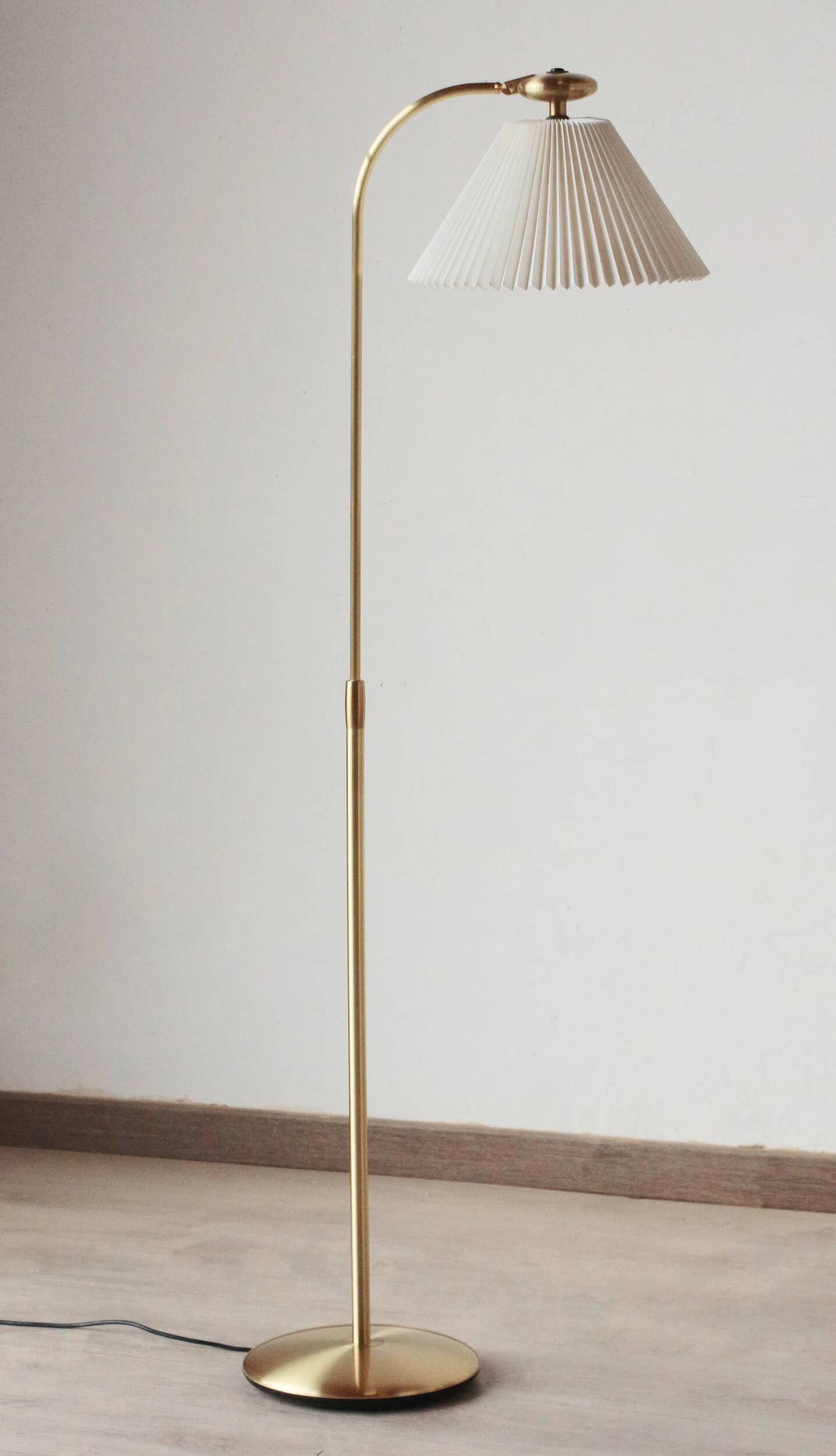 Le Klint 340 floor lamp in brass – design by Philip Bro Ludvigsen