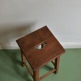 Ancient wooden workshop stool