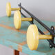 Yellow and black enamelled metal hook, 60s