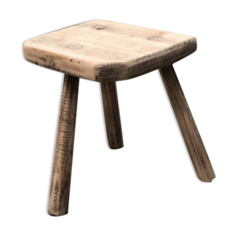 Old wooden tripod stool