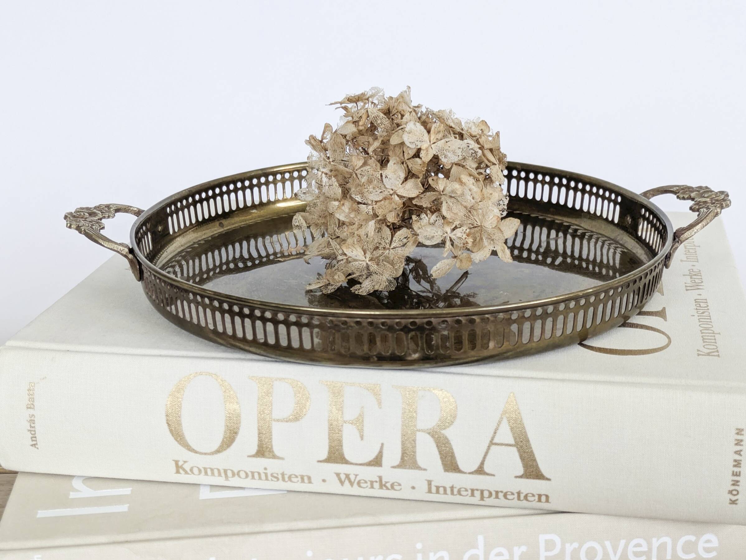 Vintage decorative brass tray, pierced edge and floral handles.