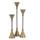 Trio of brass candlesticks by Christian de Beaumont