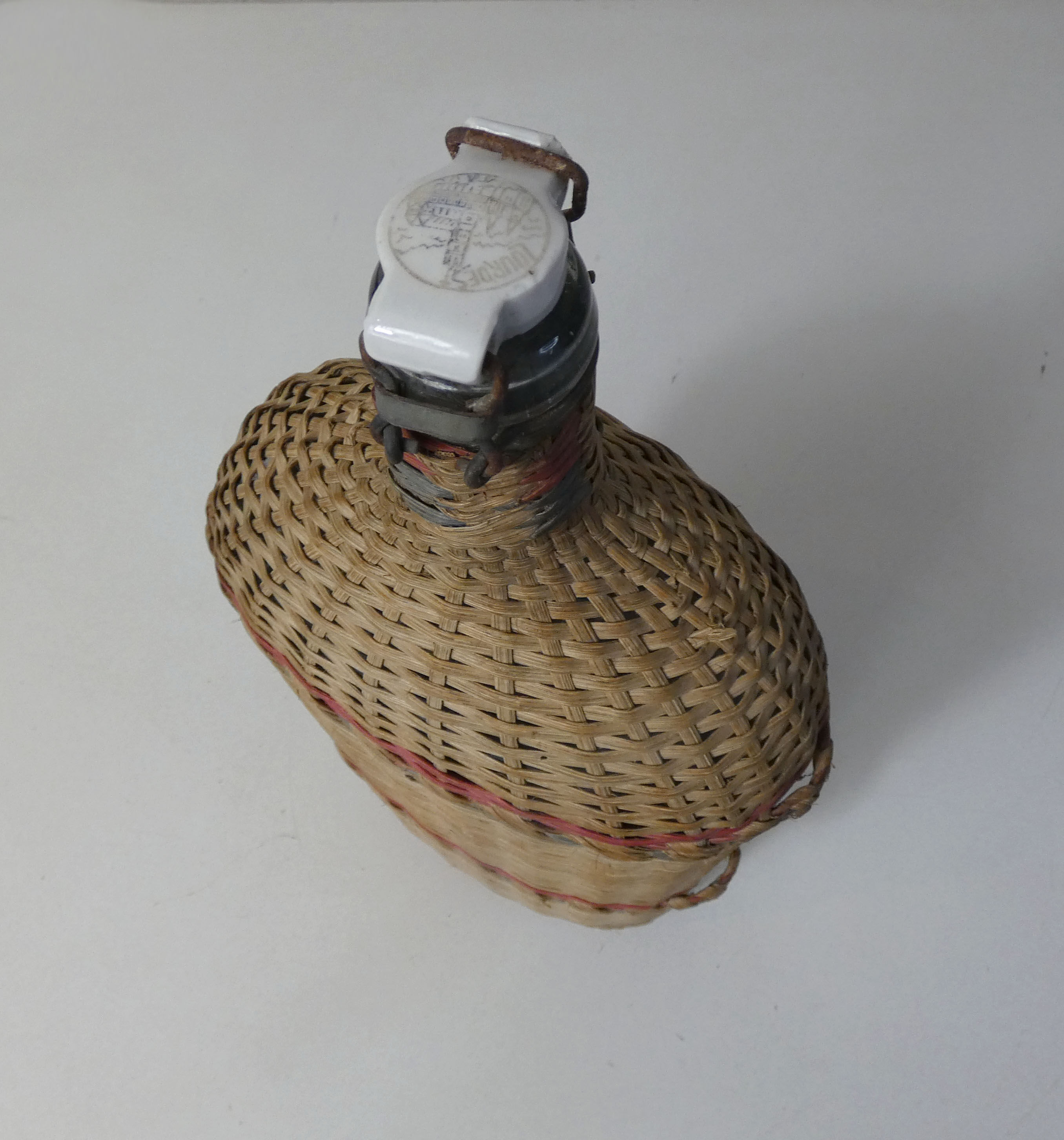 Ancient pilgrim's gourd in rattan lourdes