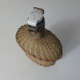 Ancient pilgrim's gourd in rattan lourdes