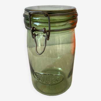 Old green glass jar solidex