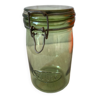 Old green glass jar solidex