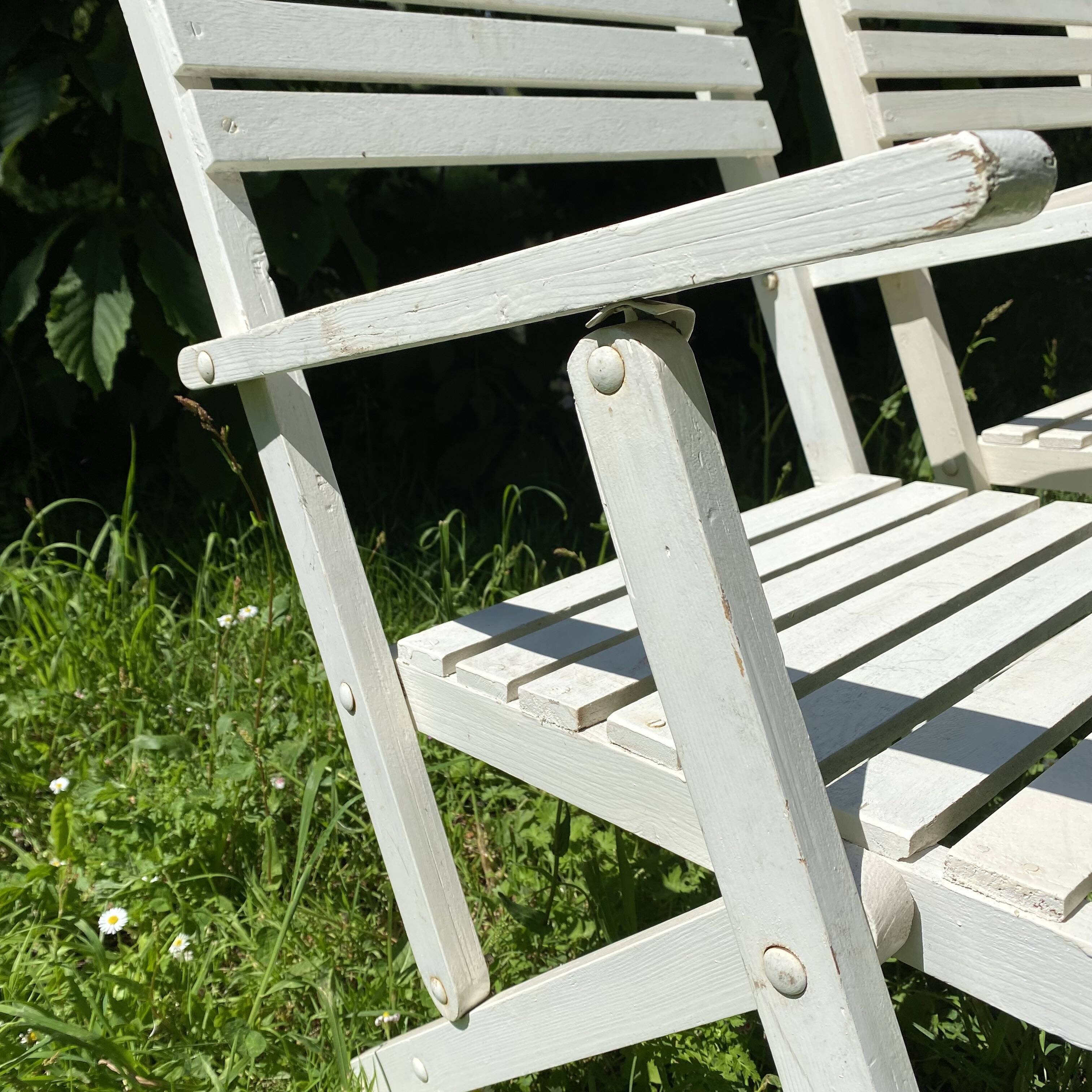 Folding slatted garden armchairs
