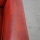 Fauteuil peint en rouge en cuir de mouton