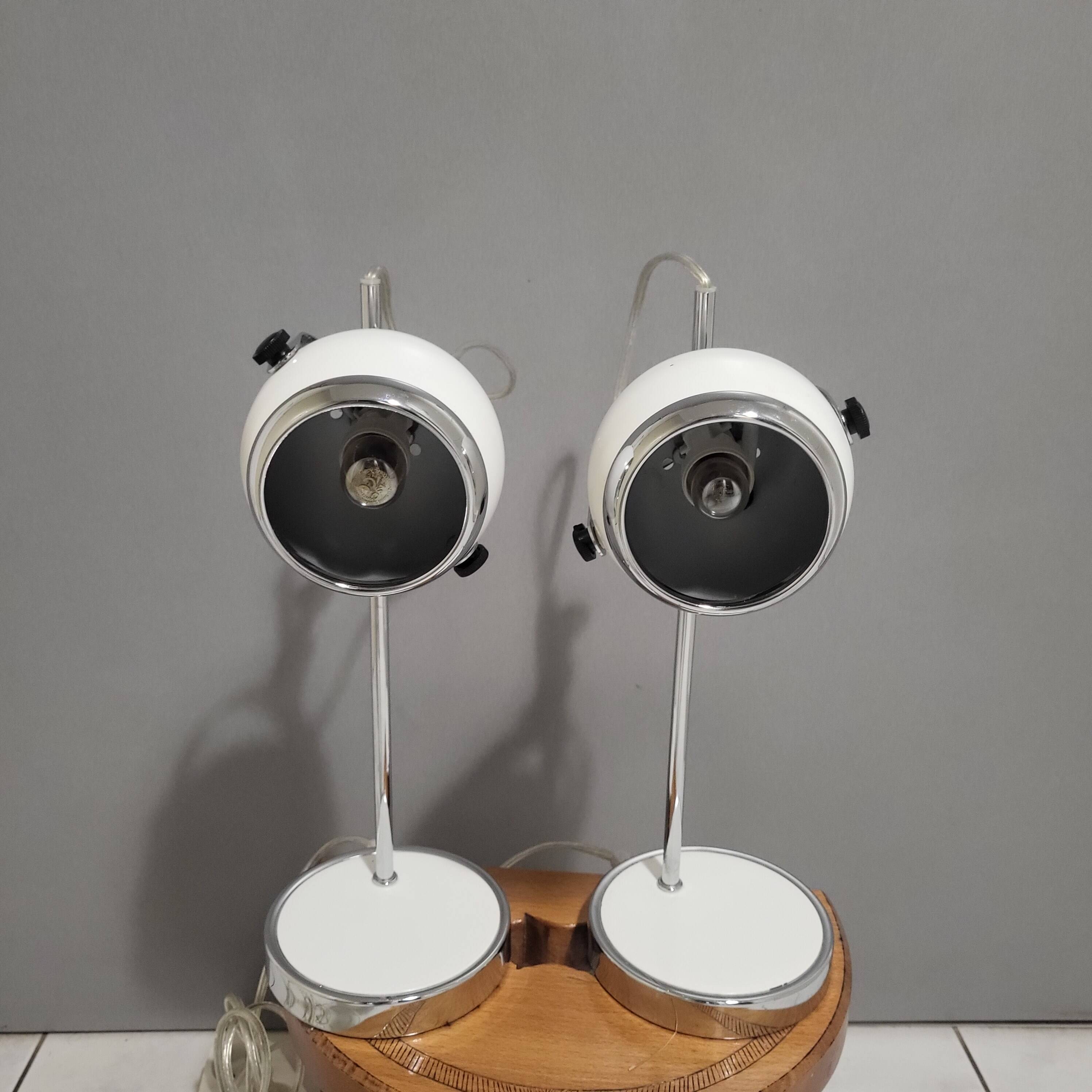 White and chrome metal eye ball lamps