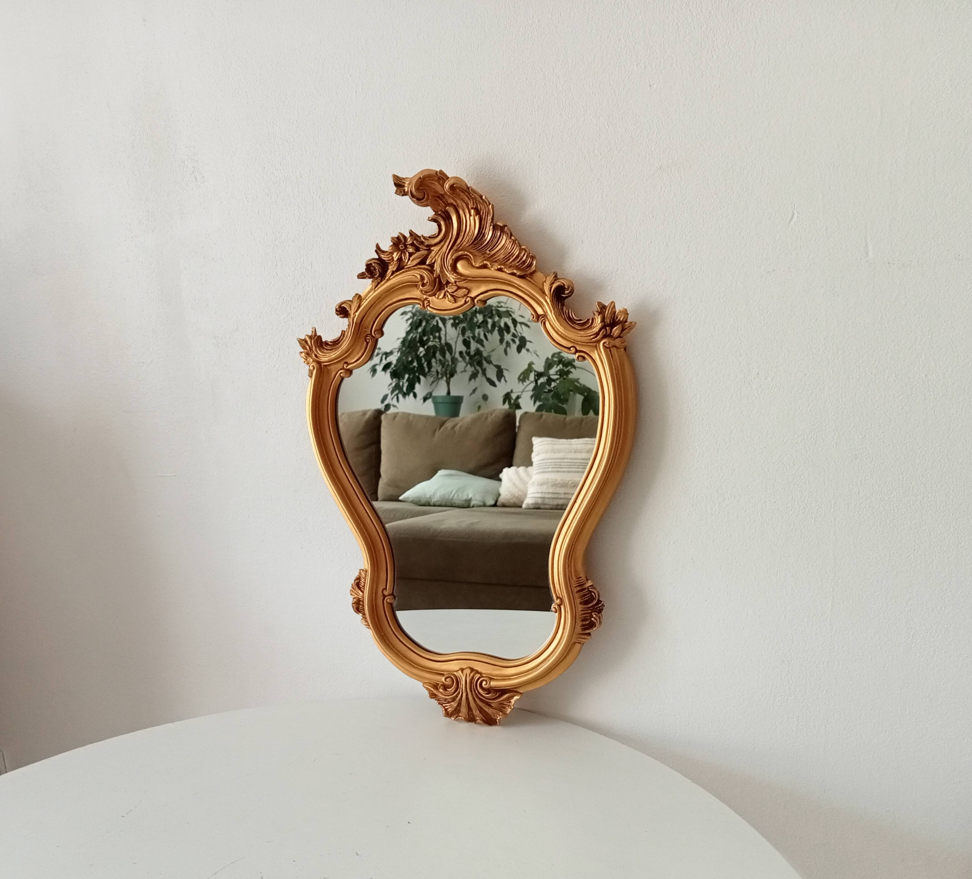 Vintage rococo mirror in gilded resin