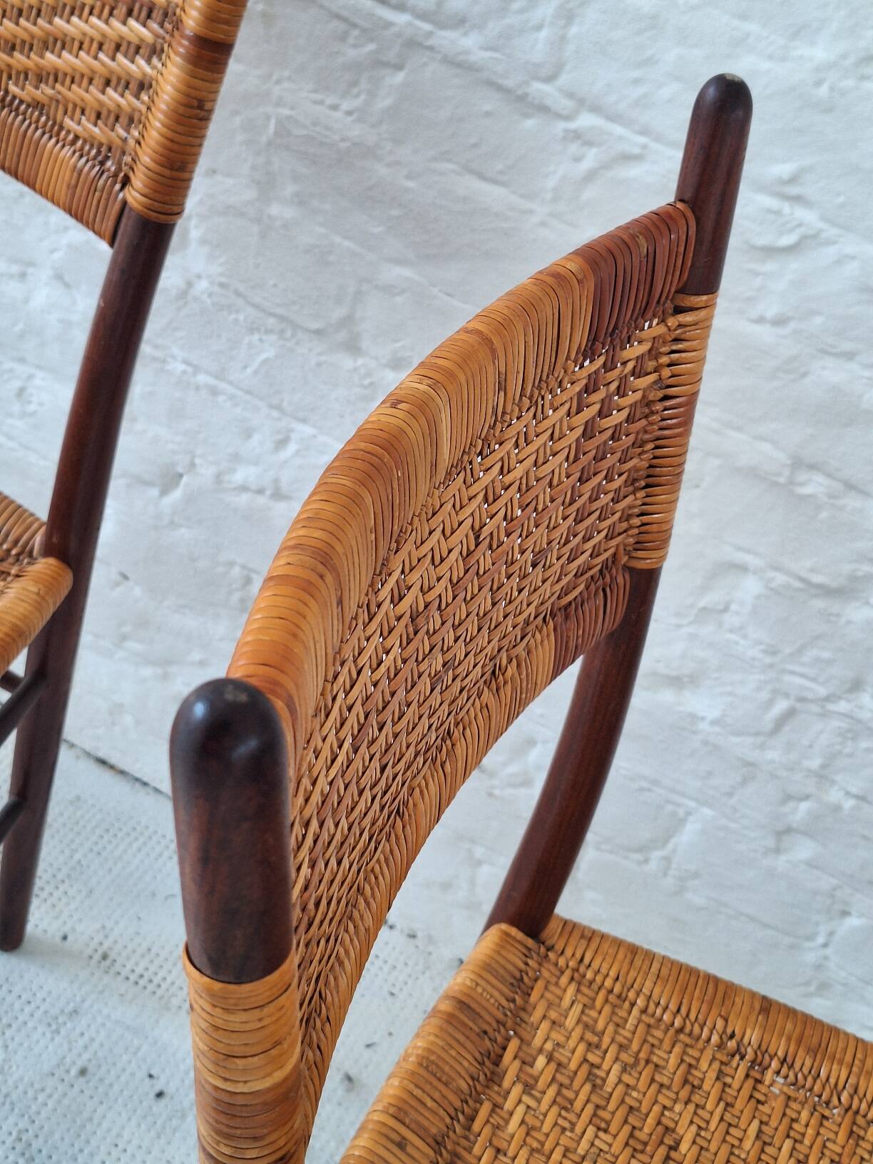 Four teak dining chairs with patinated cane after Gio Ponti, Italy 1960s
