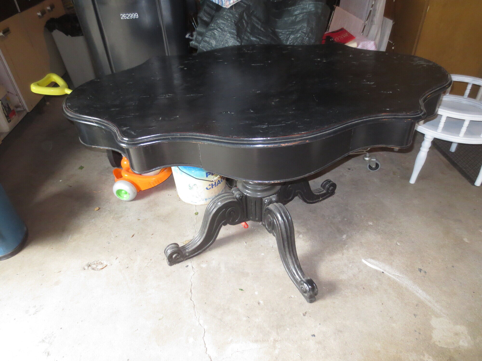 Napoleon style table restored and patinated in antique black with a drawer