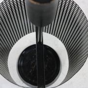Minimalistic dutch design perforated metal umbrella stand
