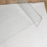 Transparent tempered glass coffee table.