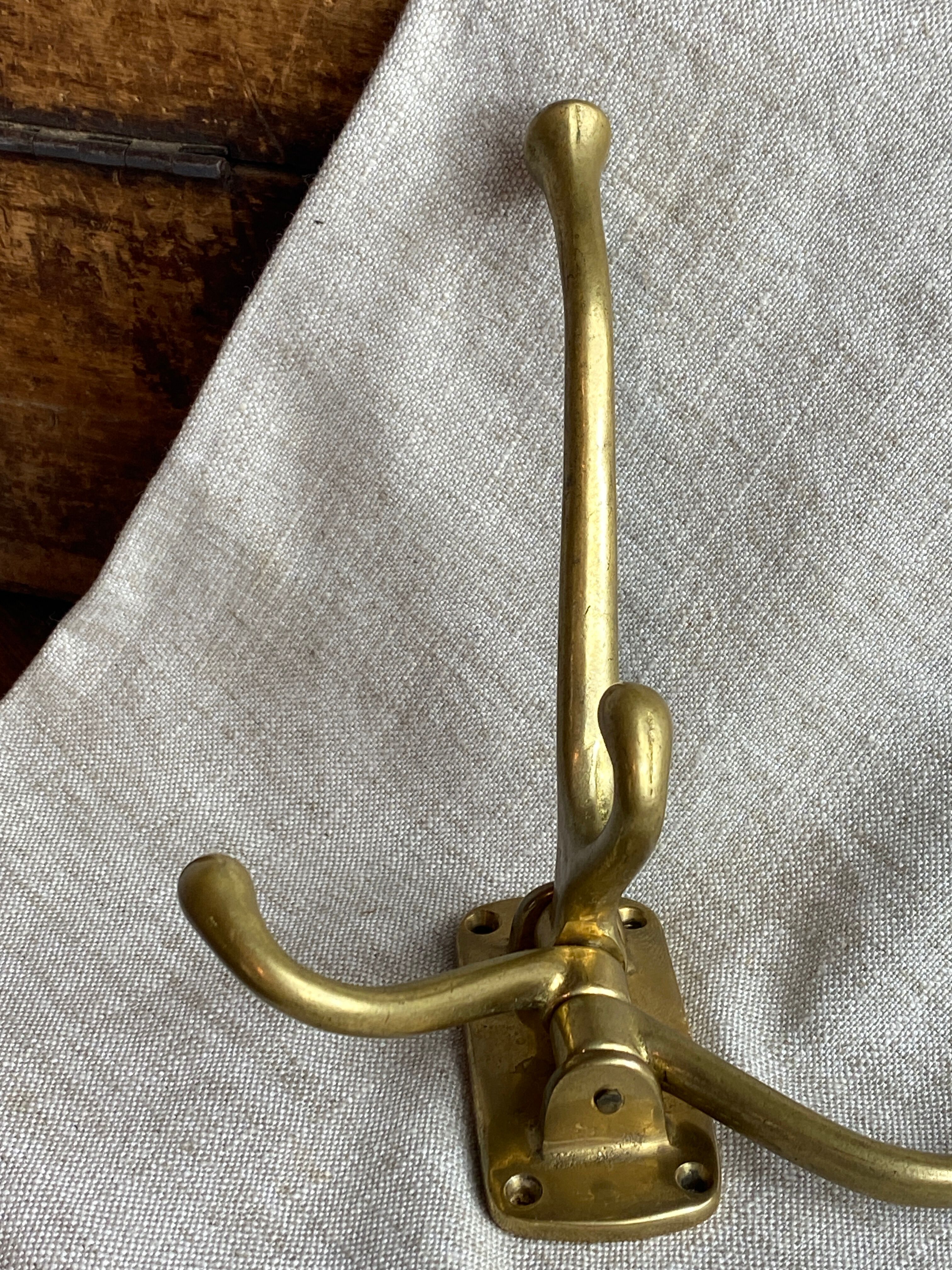 Adjustable nautical coat hook in solid brass