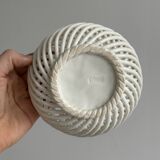 white openwork ceramic cup