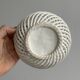 white openwork ceramic cup