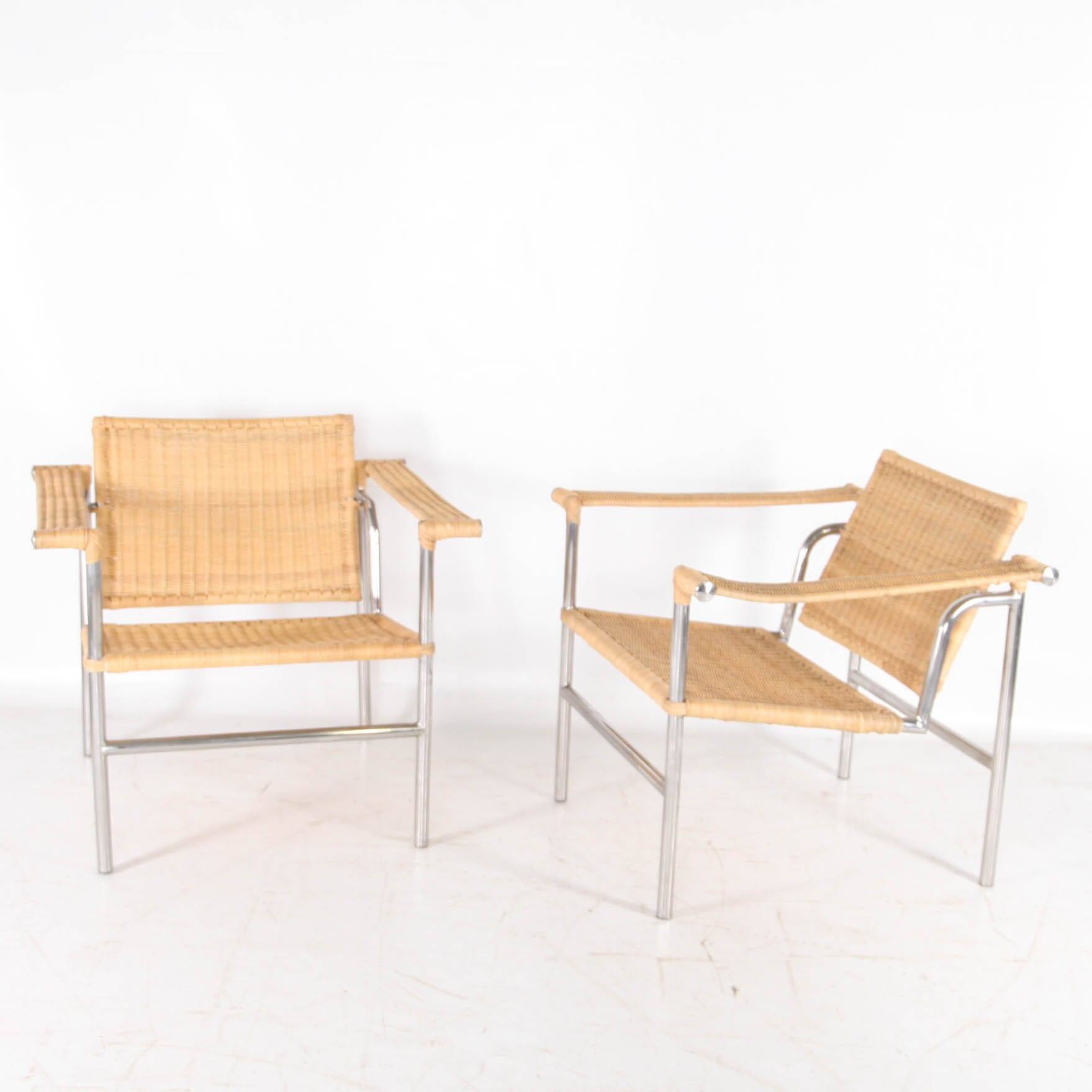 Pair of wicker and chrome armchairs