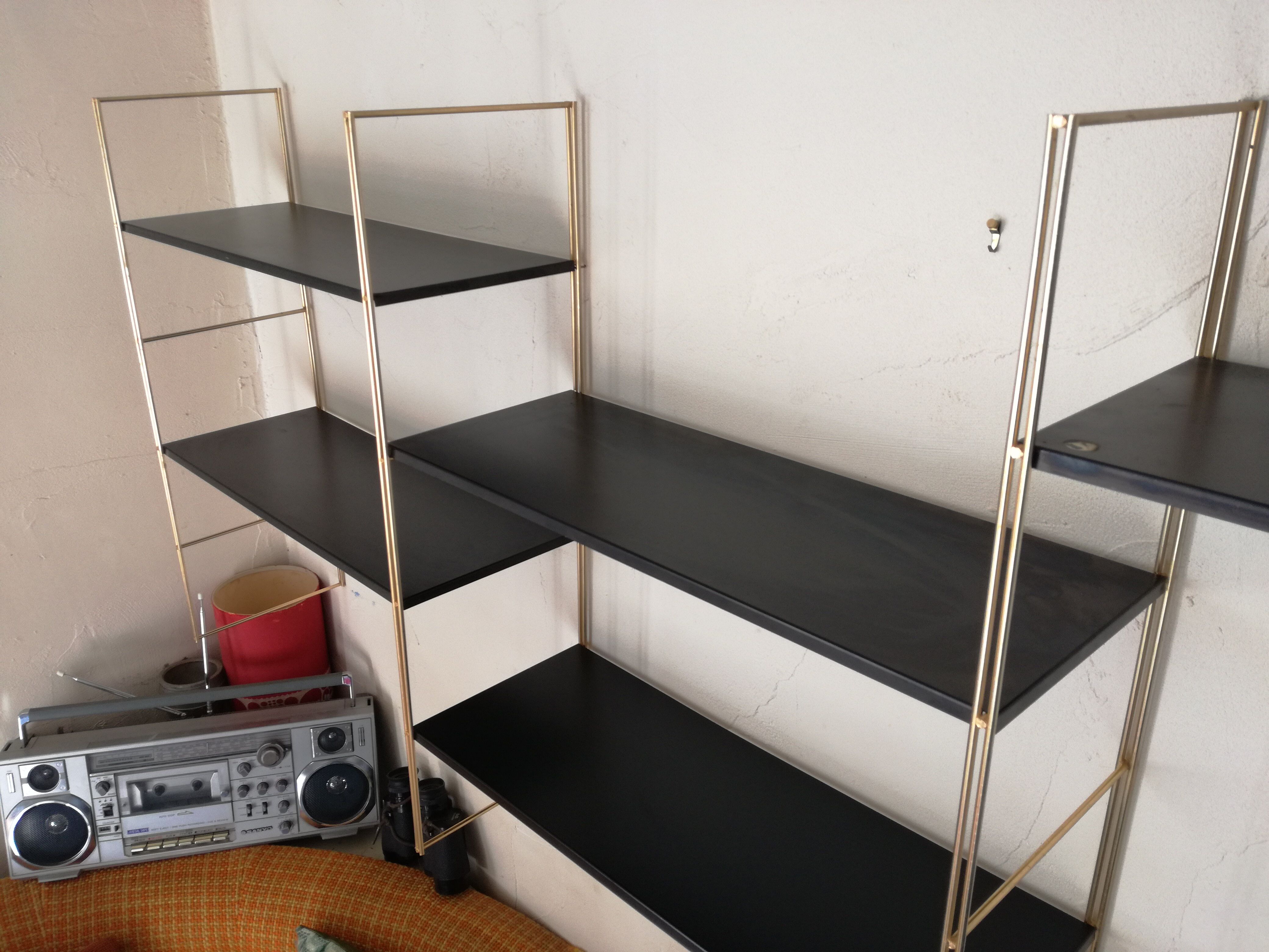 Gold and black thong shelf