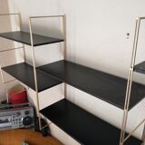 Gold and black thong shelf