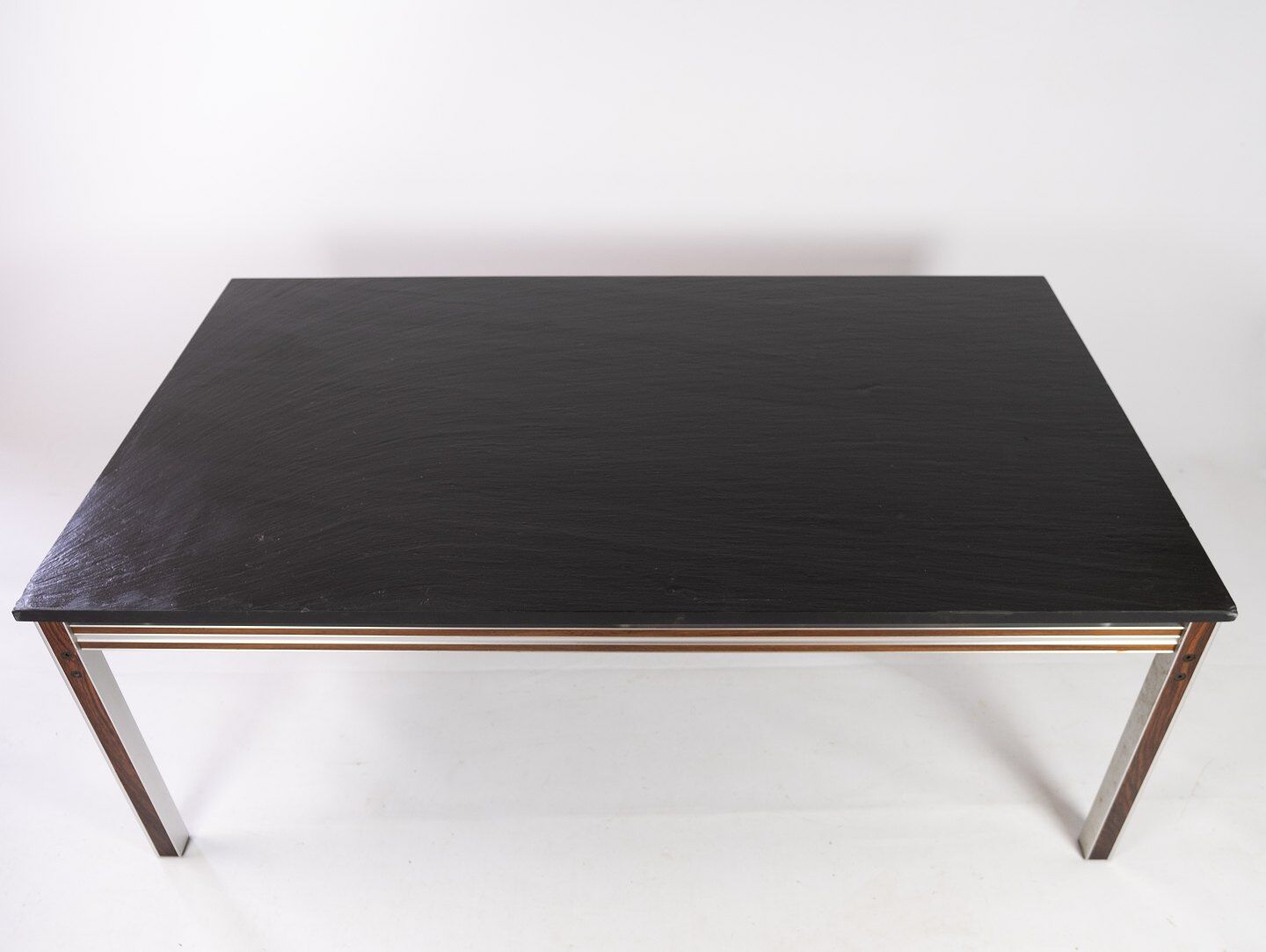 Coffee table with black slate plate and frame in rosewood and metal, of danish design from the 1970s