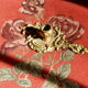 Bronze hand candle holder, cellar rat
