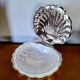 Shell-shaped butter dish in stainless steel