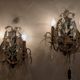 Pair of mirror sconces with two arms of light with gilded brass grapevines, Italy 1960.