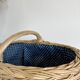 Large vintage wicker basket and blue lining with white polka dots
