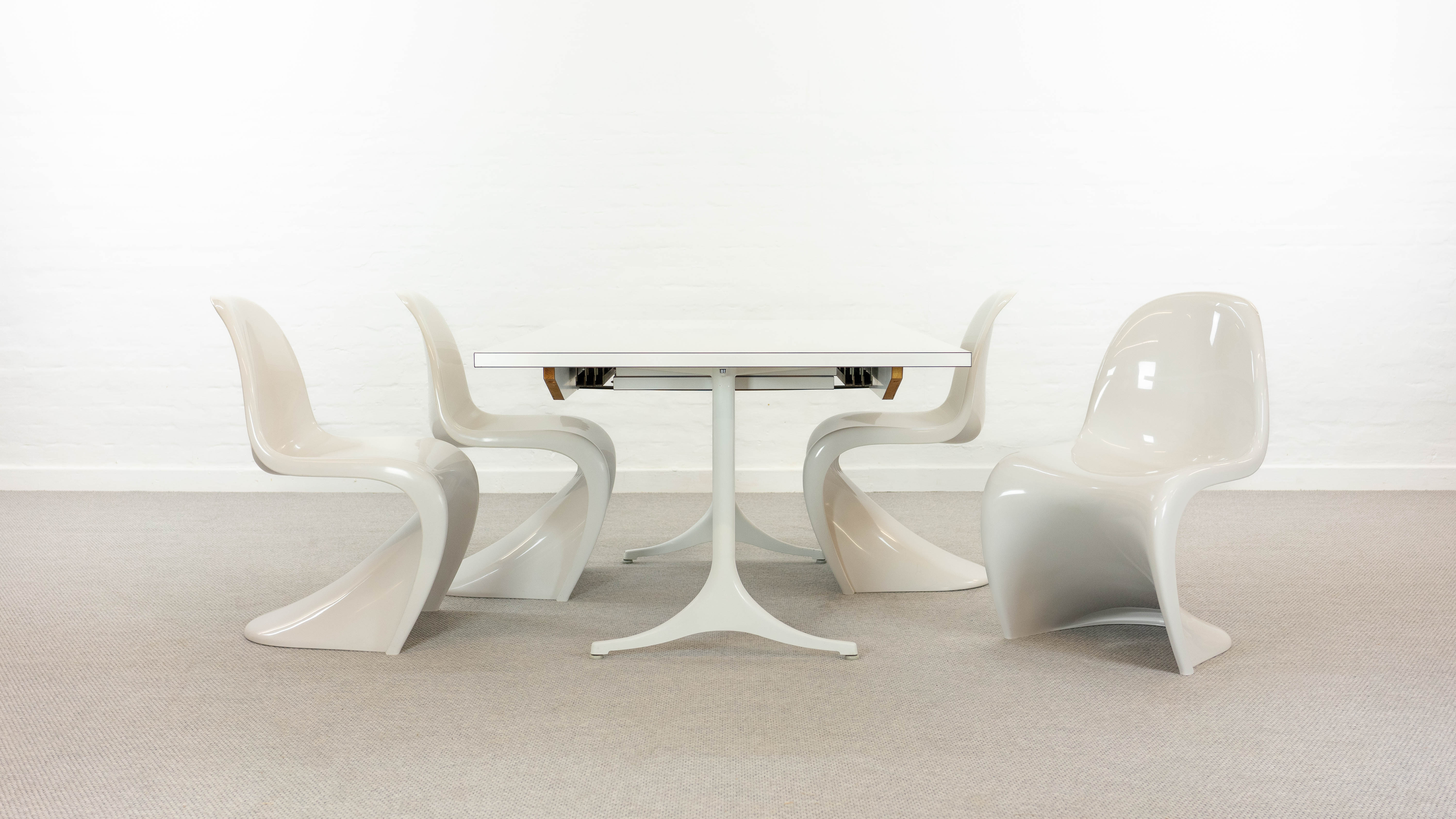 Extendable pedestal dining table by George Nelson for Herman Miller