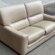 2/3-seater sofa in genuine beige leather by Roche Bobois. Very good condition, great comfort.