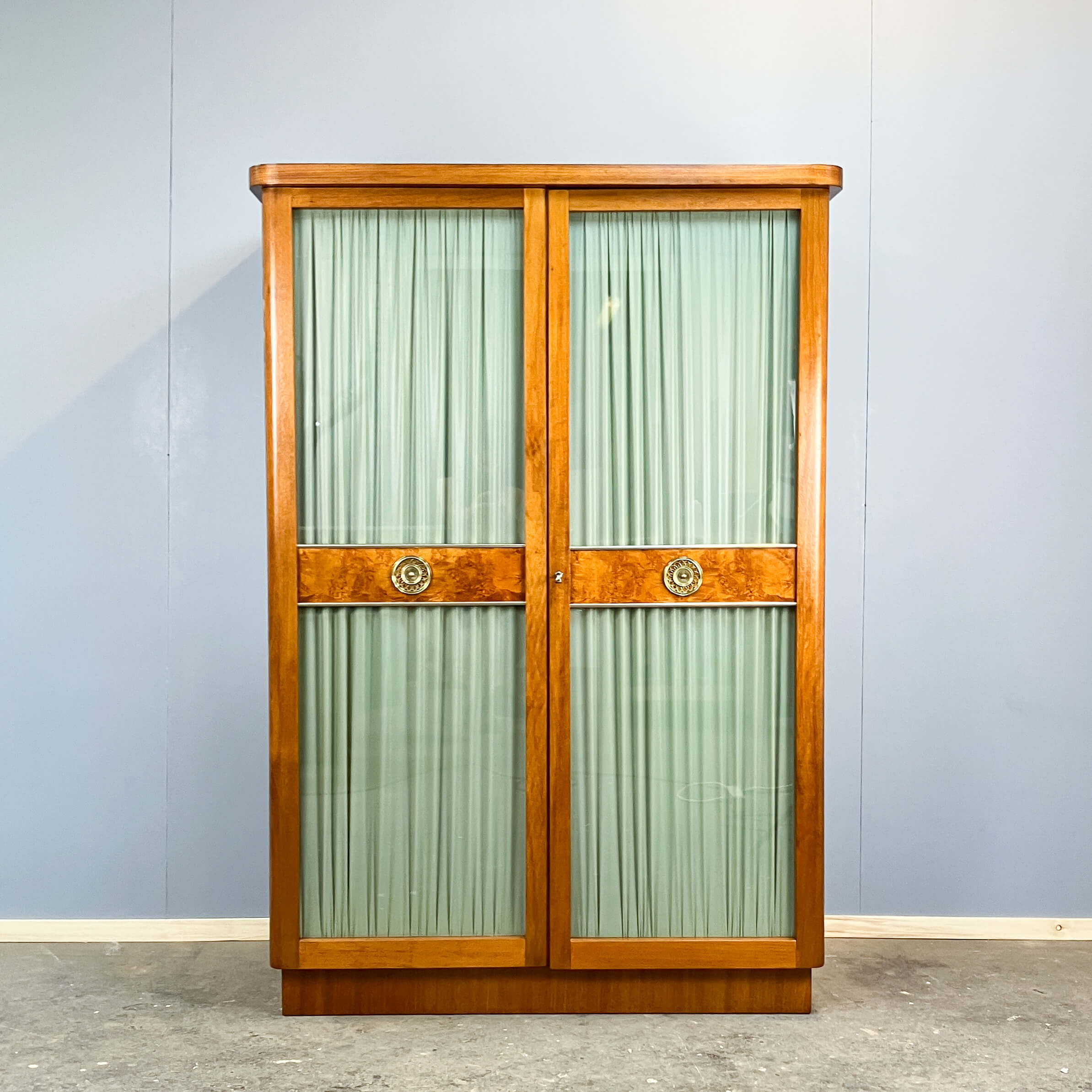 Art Deco cabinet with glass doors, various woods, 1930s