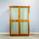 Art Deco cabinet with glass doors, various woods, 1930s
