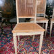 Set of four grey lacquered wooden chairs in the Louis XVI style, late 19th century.