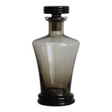 Smoked glass bottle, sculpted stopper