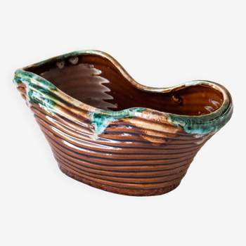 Old basket in glazed ceramic