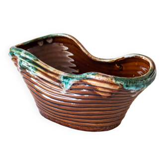 Old basket in glazed ceramic