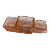 Glass condiment service in transparent pink moulded glass.