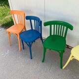 4 multi-colored bistro chairs