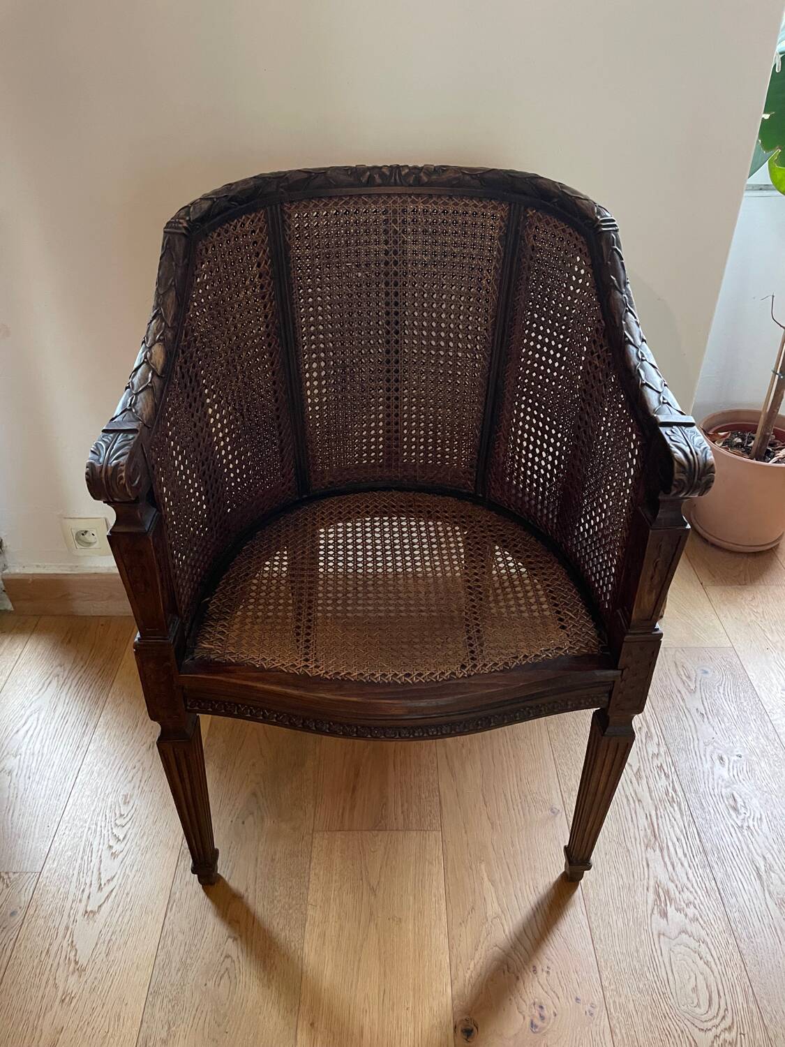 Pair of gondola armchairs in Louis XVI style with caning.