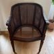 Pair of gondola armchairs in Louis XVI style with caning.