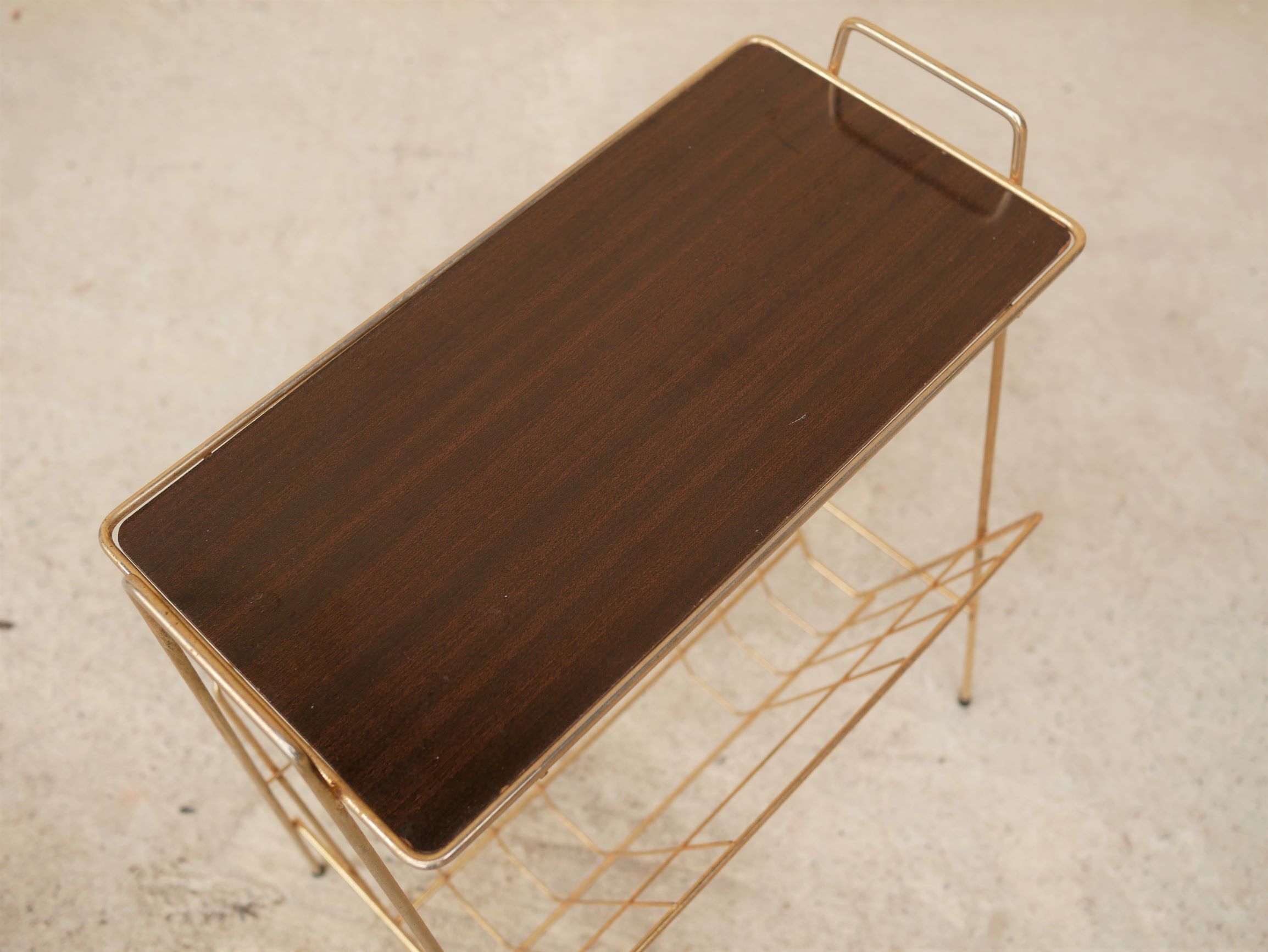 Vintage gold metal magazine rack