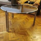 Mid-century round coffee table in silver chrome with a glass top — 1960s