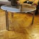 Mid-century round coffee table in silver chrome with a glass top — 1960s