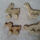 set of 4 wooden toys on wheels